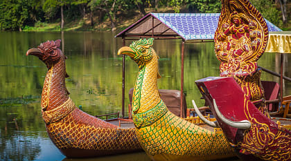 Boat on lake near Bayon temple in Cambodia. 
