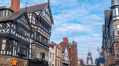 Half-timbered buildings with the Eastgate and Eastgate Clock in the old city of Chester, England