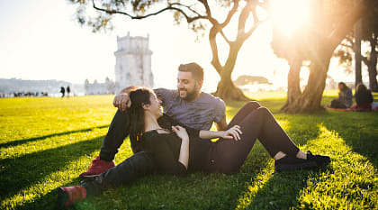 Couple at the park near Belem Park in Lisbon, Portugal