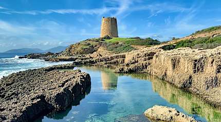 Tower ruins on the coast of Sardinia, Italy.