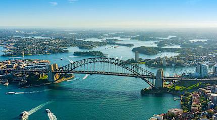 Australia’s iconic Harbour Bridge in Sydney showcases the vibrant city.