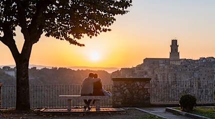 Couple in Pitigliano at sunset Tuscany, Italy