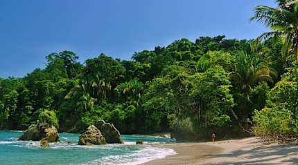 Woman walking on the beach in Costa Rica