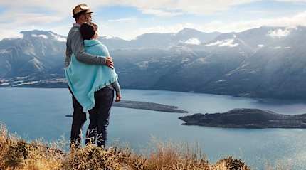 Couple enjoying the view in Queenstown, New Zealand 