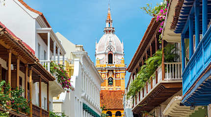 Balconies with flowers leading to cathedral in Cartagena, Colombia