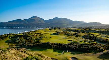 Royal County Down Golf Club with the Mourne Mountains in the distance