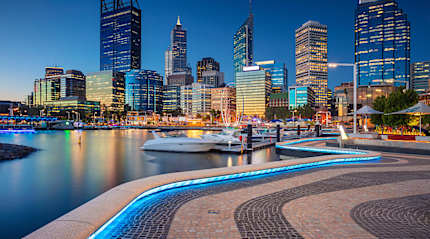 The modern skylines of Perth, at twilight.