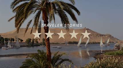Feluccas on the Nile near sand dunes in Aswan, Egypt, with five-star traveler story graphic