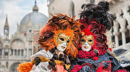 Masked revelers at Carnival in Venice, Italy