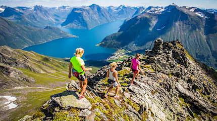 Hiking Hjørundfjord in Norway.  Photo  courtesy of Håvard Myklebust / www.fjordnorway.com