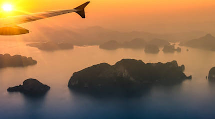Flying over Phang Nga Bay at sunset