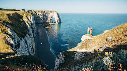 Couple at the Étretat Cliffs in France