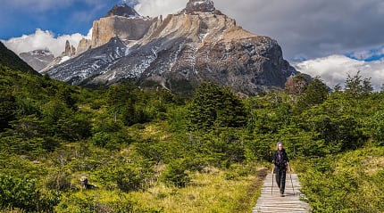 Woman hiking in Torres del Paine National Park, Chile