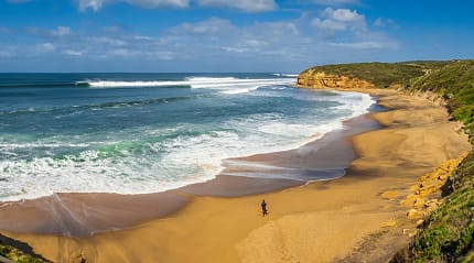 Surfer at Bells Beach in Victoria, Australia