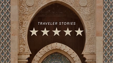 5-star traveler story over Moroccan tile work and carved arch detail at Hassan II Mosque in Casablanca