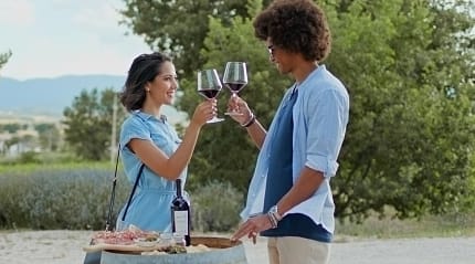 A couple is tasting young wine at one of the wineries in Italy, Umbria region