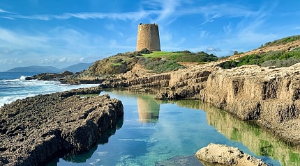 Tower ruins on the coast of Sardinia, Italy.