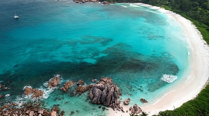 Turquoise waters and iconic granite boulders — paradise found at Anse Lazio, Praslin Island, Seychelles.