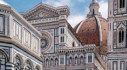 Architectural detail and the dome of Cathedral of Santa Maria del Fiore in Florence, Italy