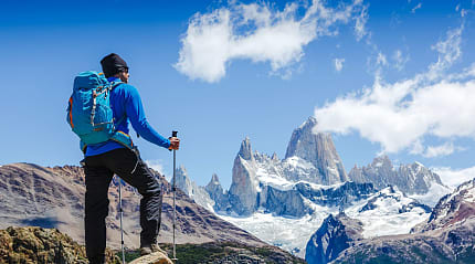 Hiker enjoying the view of Mount Fitz Roy, Patagonia