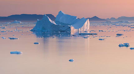 An iceberg drifting through the waters of Greenland.