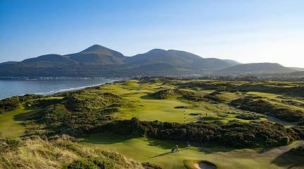 Royal County Down Golf Club with the Mourne Mountains in the distance
