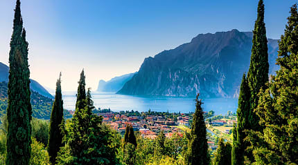 View of Lake Grade and mountains in Torbelo, Italy