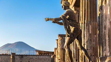 Bronze Apollo statue of the Temple of Apollo ruins at Pompeii in Naples, Italy