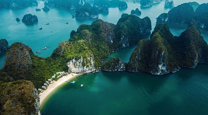 Stretch of beach on an island in Ha Long Bay, Vietnam