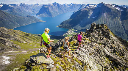 Hiking Hjørundfjord in Norway.  Photo  courtesy of Håvard Myklebust / www.fjordnorway.com