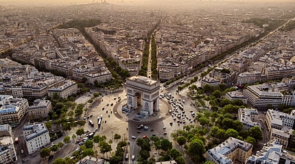 Arc de Triomphe at sunrise in Paris, France