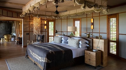 Luxurious bedroom suite at Mombo Camp in the Okavango Delta, Botswana