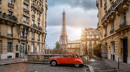 Small Paris street with view of the famous Eiffel Tower