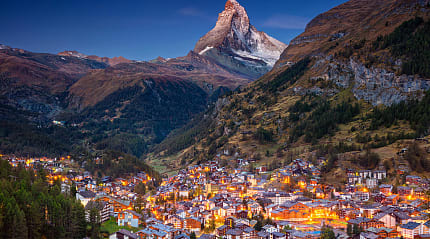 village of Zermatt, Switzerland with Matterhorn in the background during twilight in Switzerland