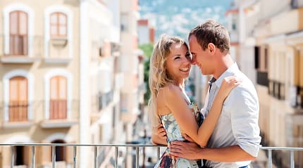 Couple on balcony in Denia, CostaBlanca, Spain