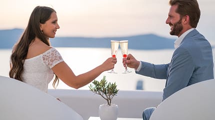 Couple in Greece at sunset.