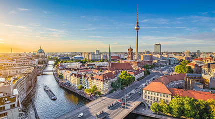 Berlin skyline with famous TV tower and Spree river 