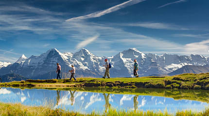 Seniors hiking in the Swiss Alps