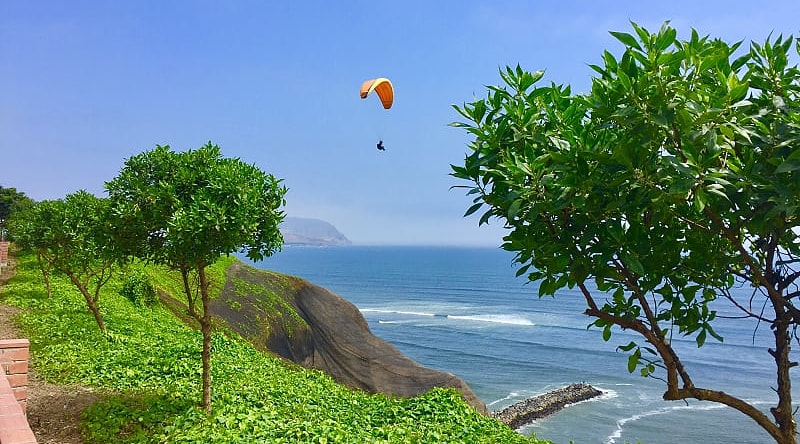 People paragliding in Miraflores, Lima, Peru. People paragliding in Miraflores, Lima, Peru.