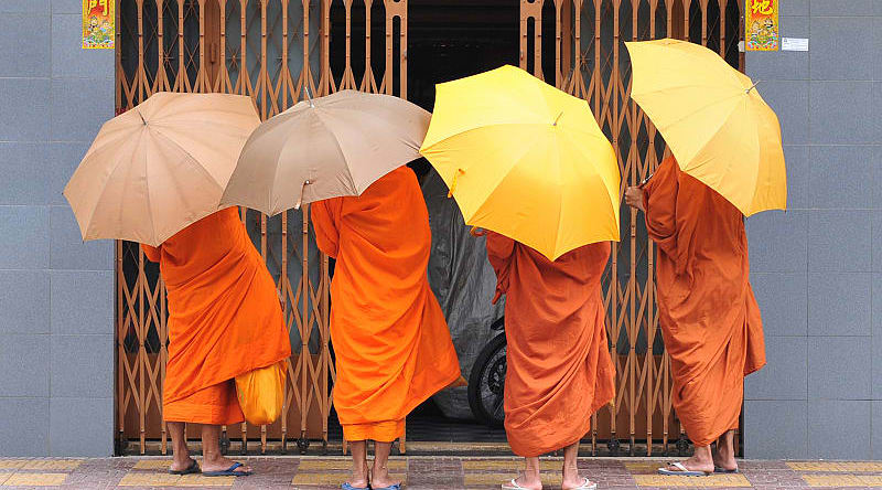 Monks on their daily tour in Phnom Penh Monks on their daily tour in Phnom Penh