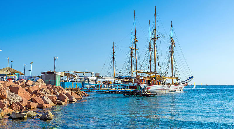 Wooden sailing ship on the coast of Eilat, Israel Wooden sailing ship on the coast of Eilat, Israel