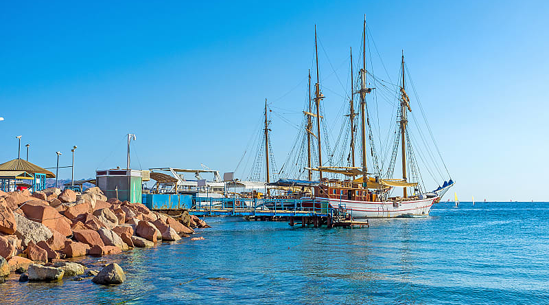 Wooden sailing ship on the coast of Eilat, Israel Wooden sailing ship on the coast of Eilat, Israel