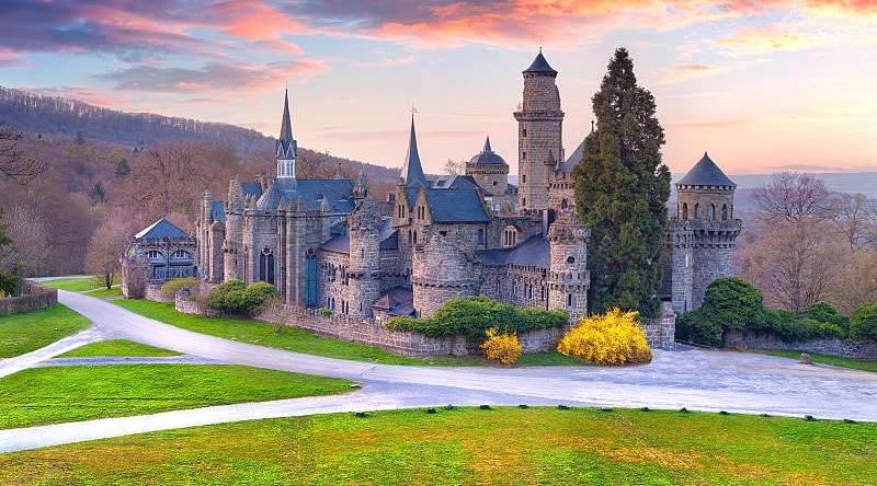 Colorful spring sunset in the Wilhelmshohe Castle, Hessen, Kassel Colorful spring sunset in the Wilhelmshohe Castle, Hessen, Kassel