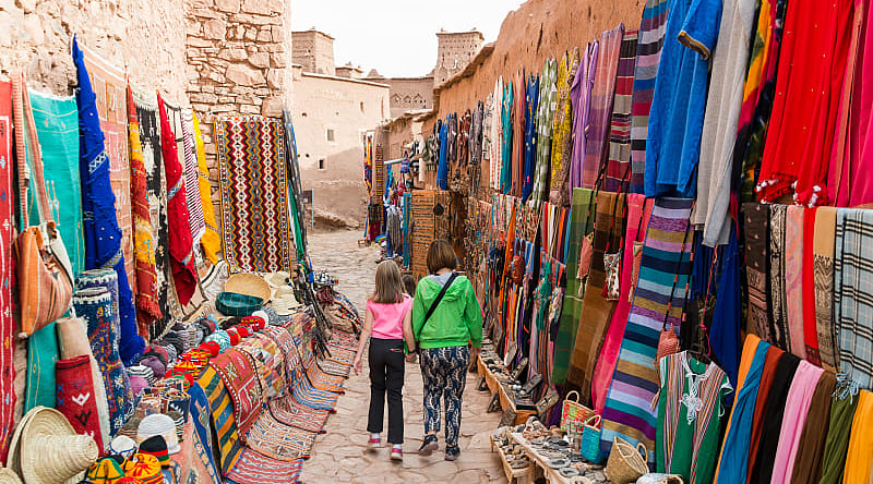 Family-Friendly Morocco Tour in One Week Mother and daughter walking on streets of Ait Benhaddou near Ouarzazate, Morocco