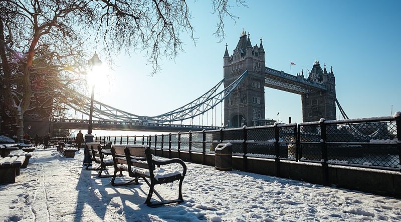 A Delightful London and Paris Winter Tour Winter snow with London Tower Bridge in England