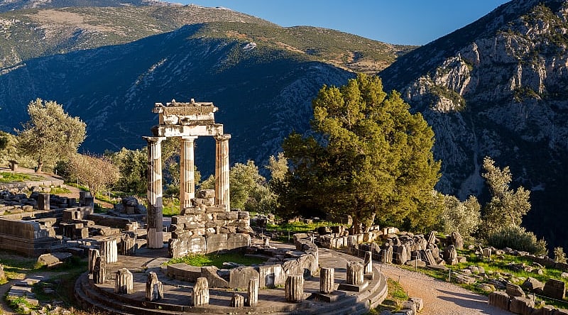 View of temple ruins in the morning in Delphi, Greece. View of temple ruins in the morning in Delphi, Greece.
