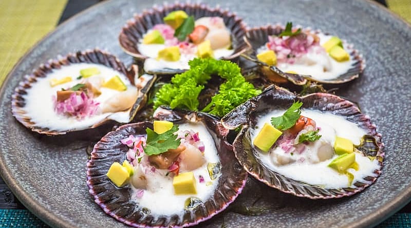 Fresh scallops served at a restaurant in Peru Fresh scallops served at a restaurant in Peru