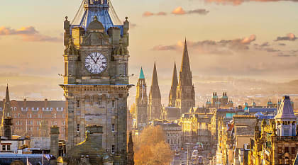 Old town Edinburgh city skyline in Scotland at sunset