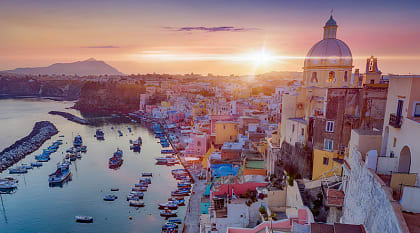 Romantic sunset over Procida, one of the Flegrean Islands off the coast of Naples in southern Italy
