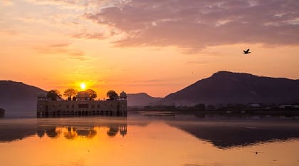Romantic sunset over Jal Mahal on Man Sagar lake in Jaipur, India